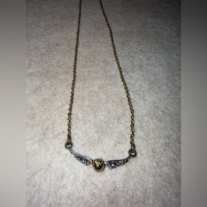 Harry Potter Warner Bros Universal Golden Snitch Silver and Gold Color Necklace